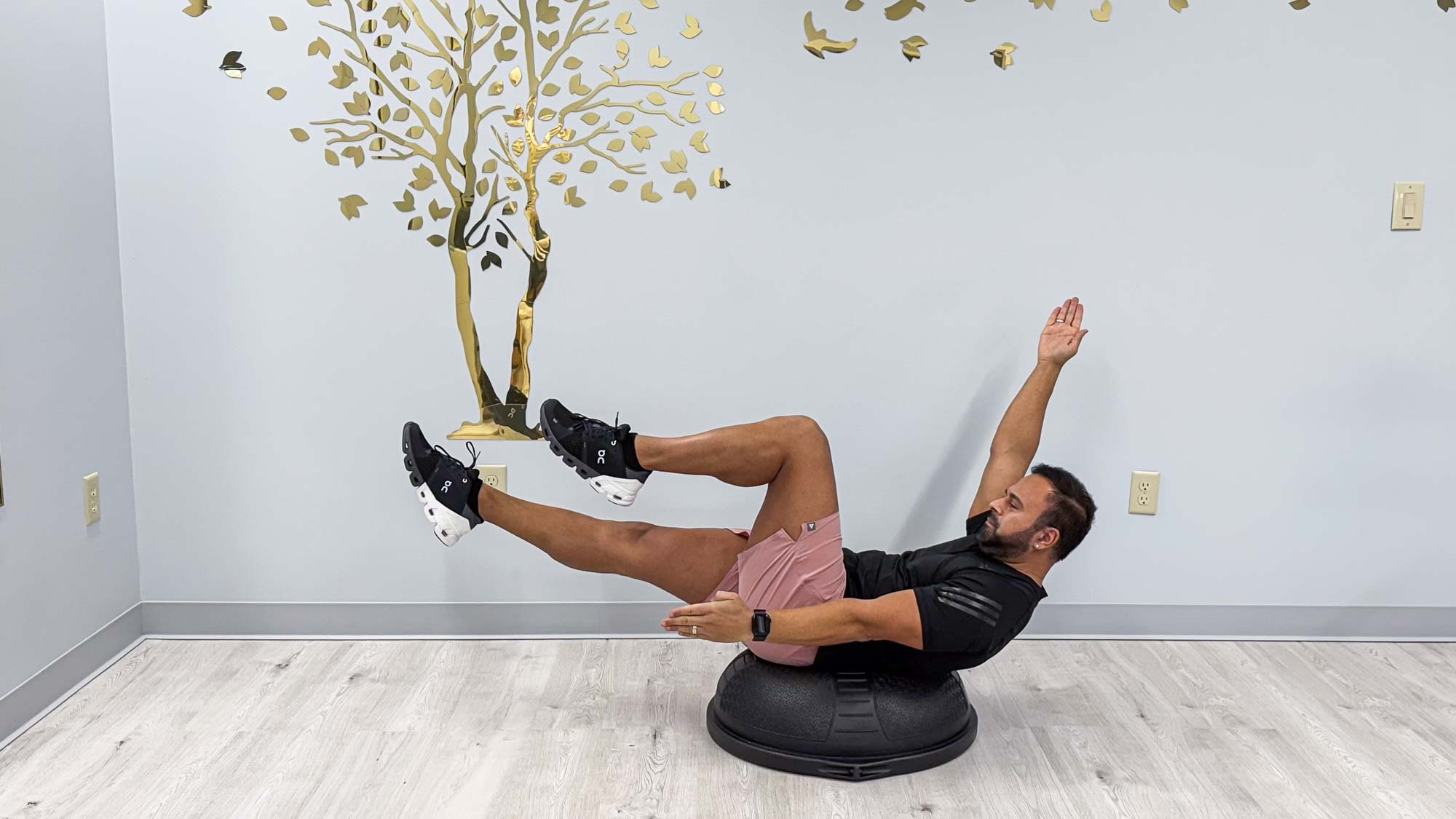 Nico Gonzalez starting the BOSU dead bug to stand exercise