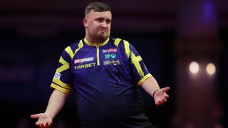 Luke Littler of England celebrates after hitting a '9 dart finish' during the Semi-Final match between Luke Littler of England and Josh Rock of Northern Ireland on day eight of the 2025 Betfred World Matchplay at Winter Gardens on July 26, 2025 in Blackpool, England.