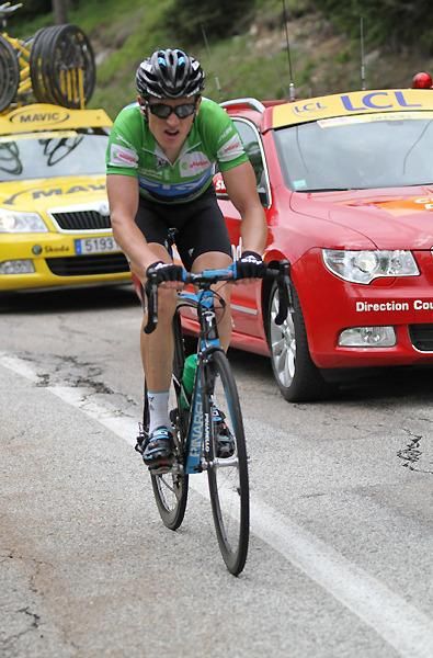 - Riding amongst the cars, the Green Jersey Geraint Thomas (GBr) Sky Professional Cycling Team