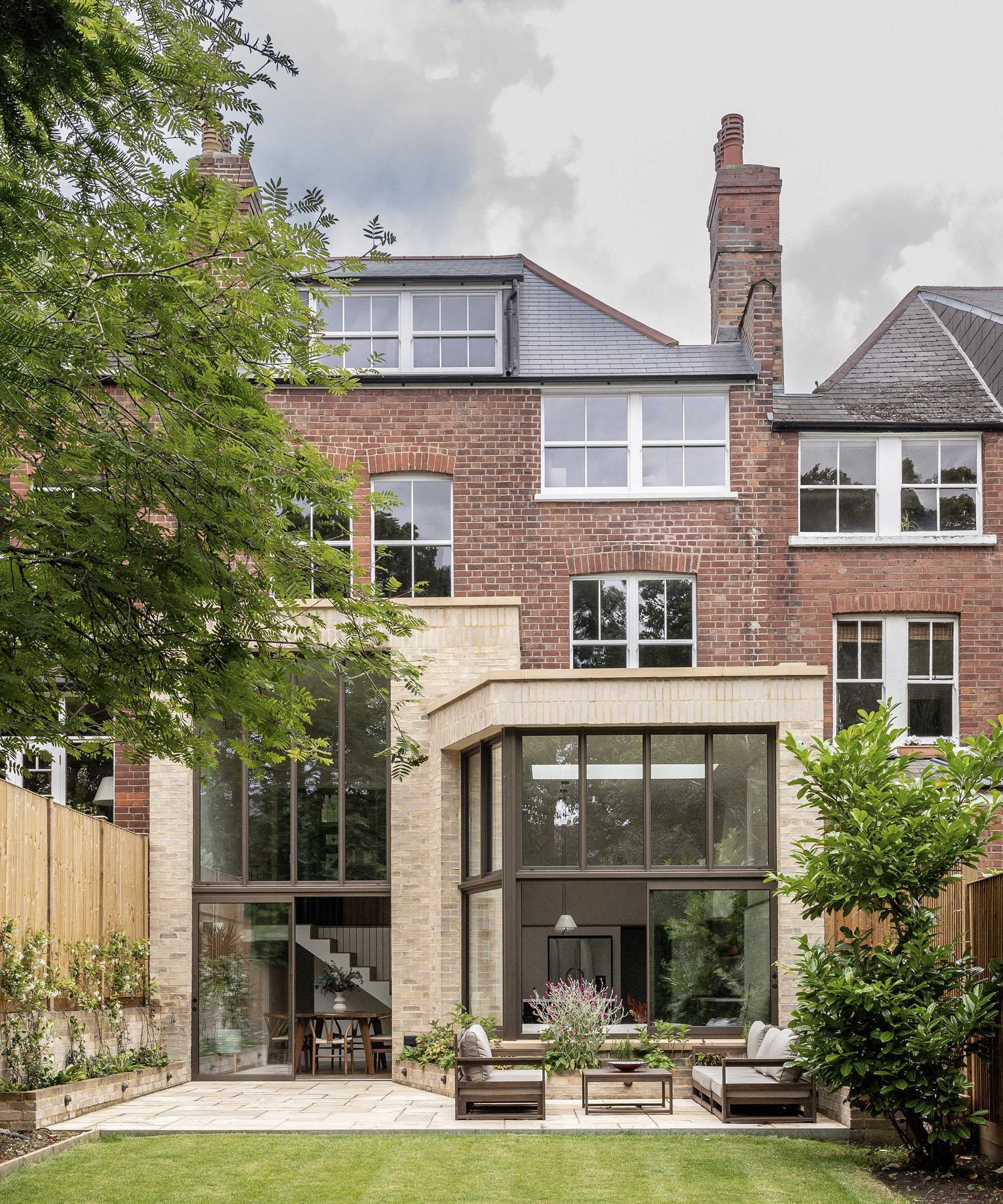 A double-heigh rear extension with architectural glazing on a large terraced house