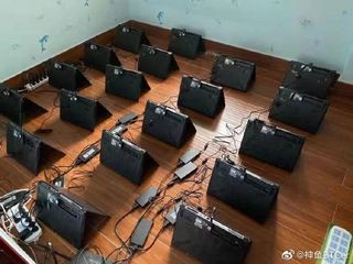 Weibo user BTCer showing off his laptop mining farms