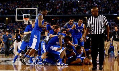 Kentucky celebrates after clinching a spot in the NCAA Tournament title game