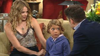 Allison Lanier and Kellen Enriquez as Summer and Harrison sitting at the Abbott Mansion in The Young and the Restless