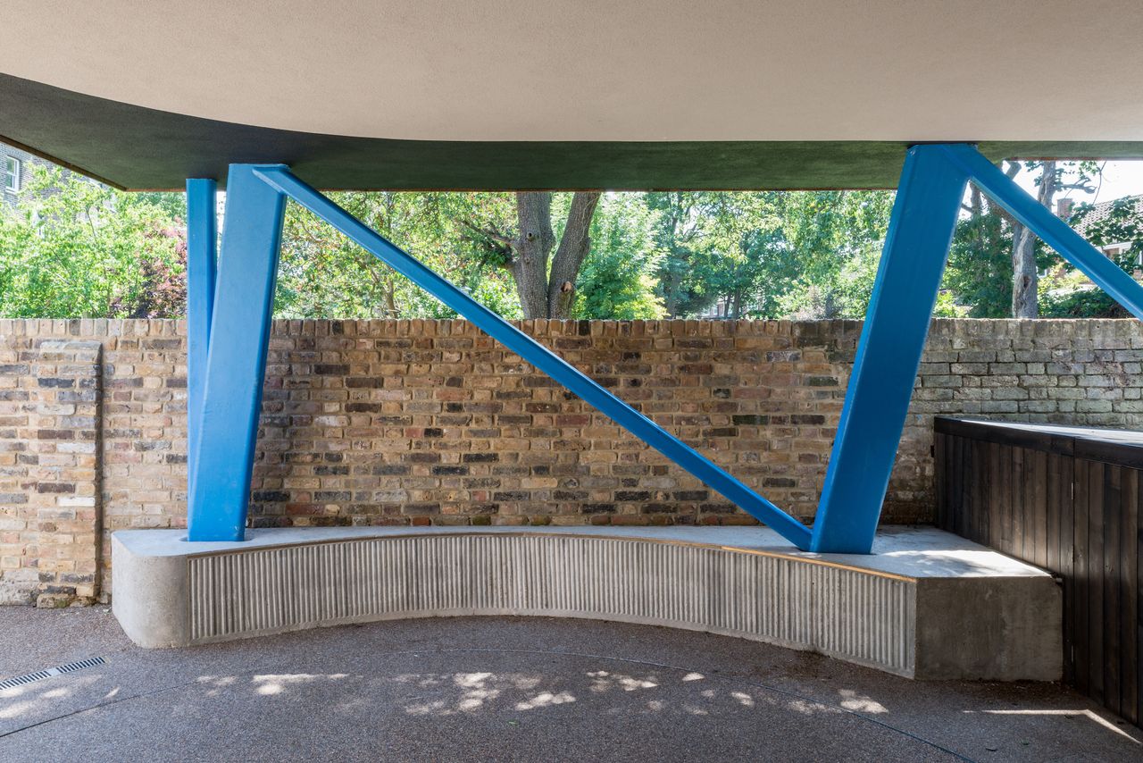 underneath car port with blue steel supports