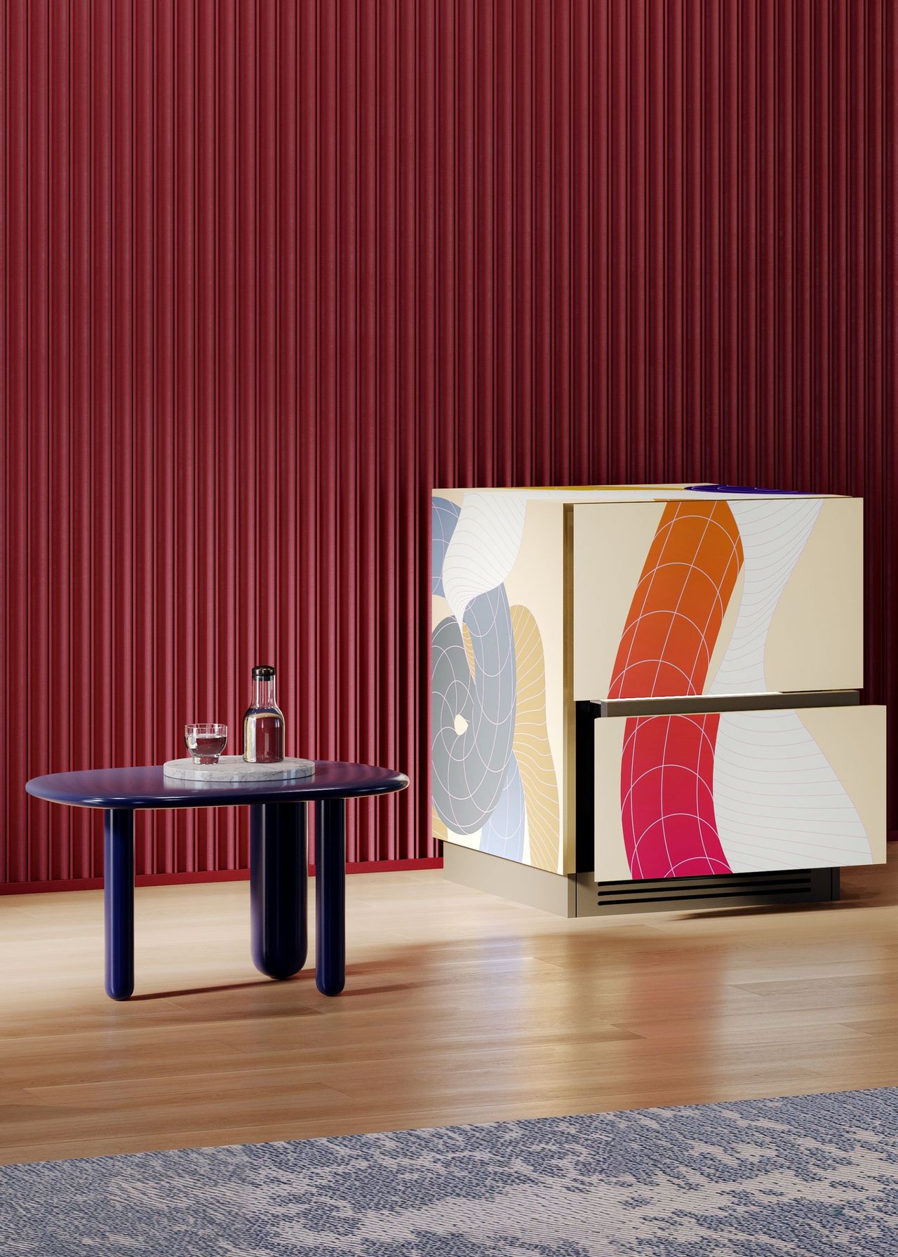 A colorful fridge that blends in seamlessly into a space. Next to the fridge is a side table with water on top.