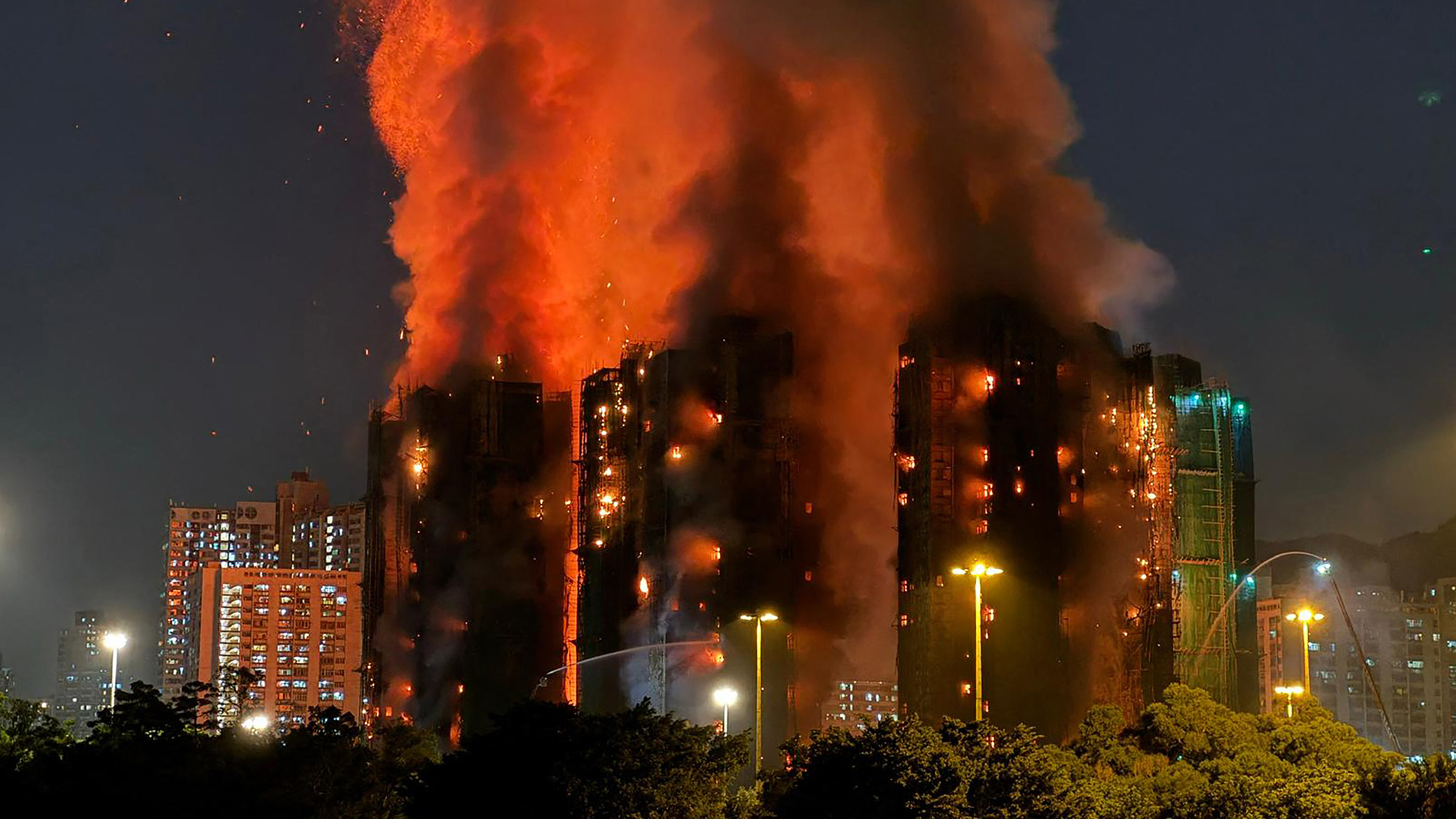 Deadly fire engulfs multiple high-rise buildings in Tai Po district, Hong Kong