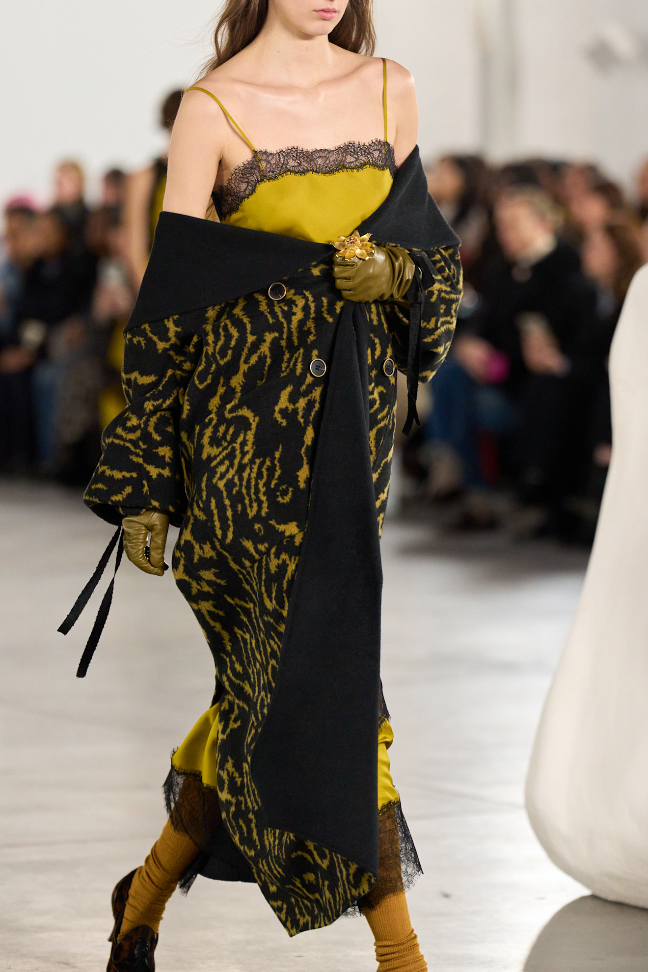 A model wore the mustard yellow color trend on the Ulla Johnson Fall 2026 runway