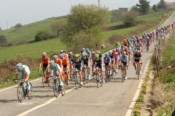 The peloton raced under sunny skies