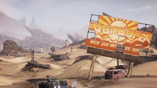 There are several shanty houses and abandoned vehicles dotted across a desert landscape. In the forefront is a massive, broken billboard which has the image of a bright sun shining over mountains with 'Pandora' written across in big letters.