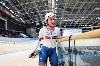 Imogen Wolff celebrating inside a velodrome