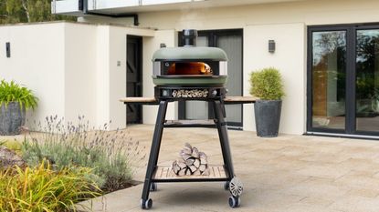 Best pizza oven - Gozney Dome on a tiled floor