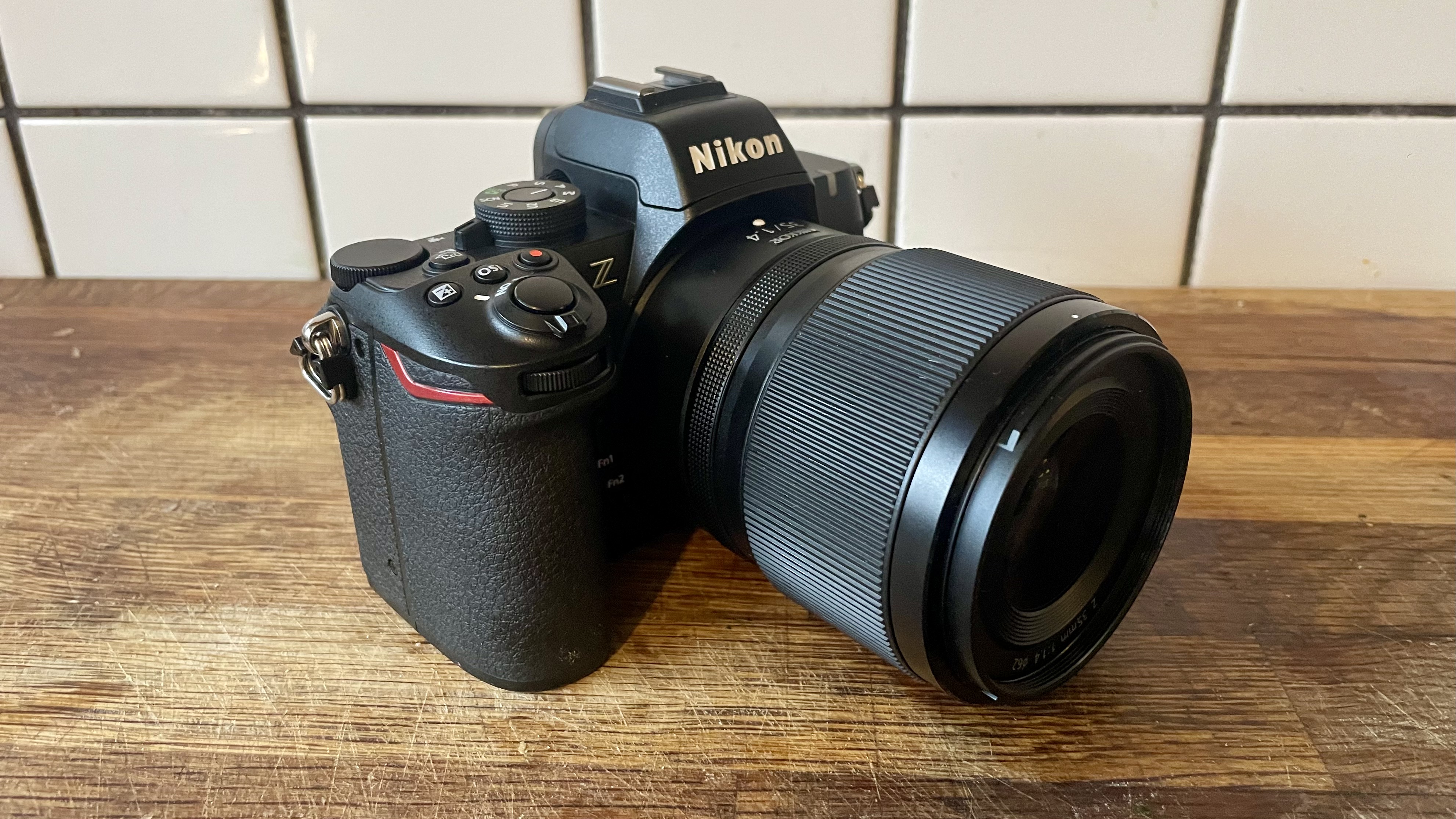 Nikon Z50 II mirrorless camera on a wooden tabletop