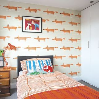 kids bedroom cartoon wallpaper and bed