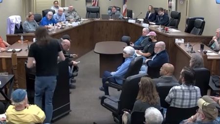 Mr Hollingsworth speaking at a city council planning meeting for the city of Ravenna, in Ohio.