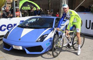 Elia Viviani (Liquigas - Cannondale) poses with a fast-looking police car
