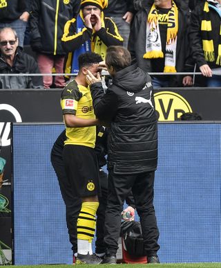 Sancho receives treatment after being hit