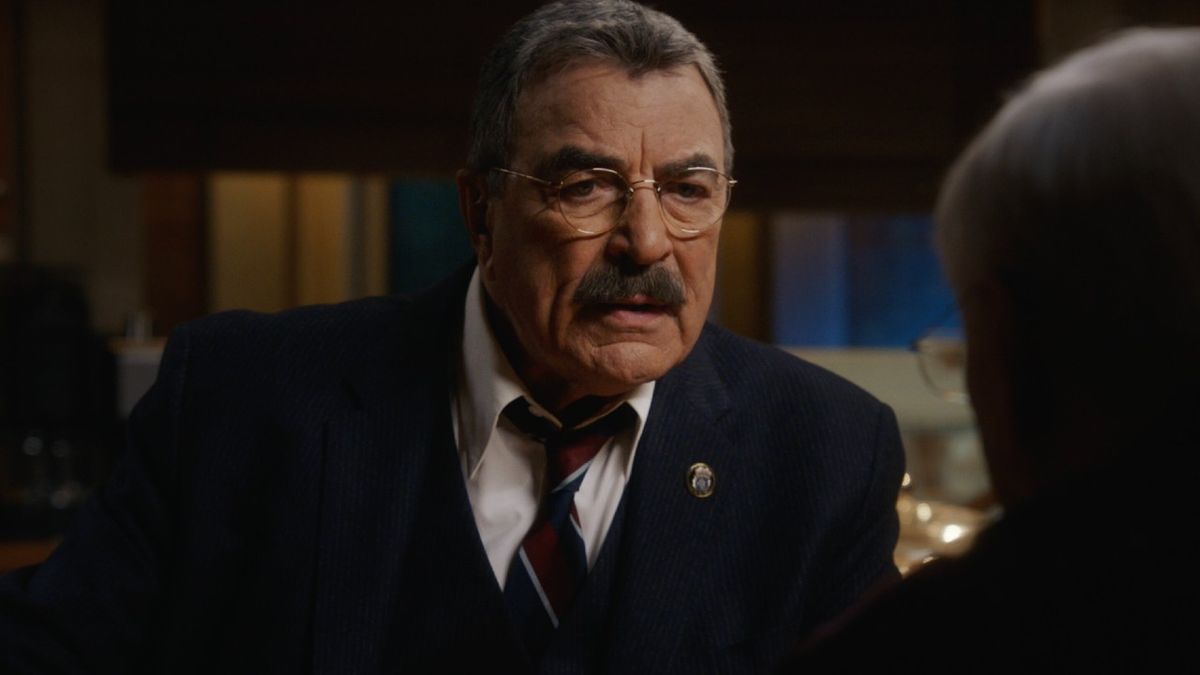 Tom Selleck looking intensely at another person in Blue Bloods.