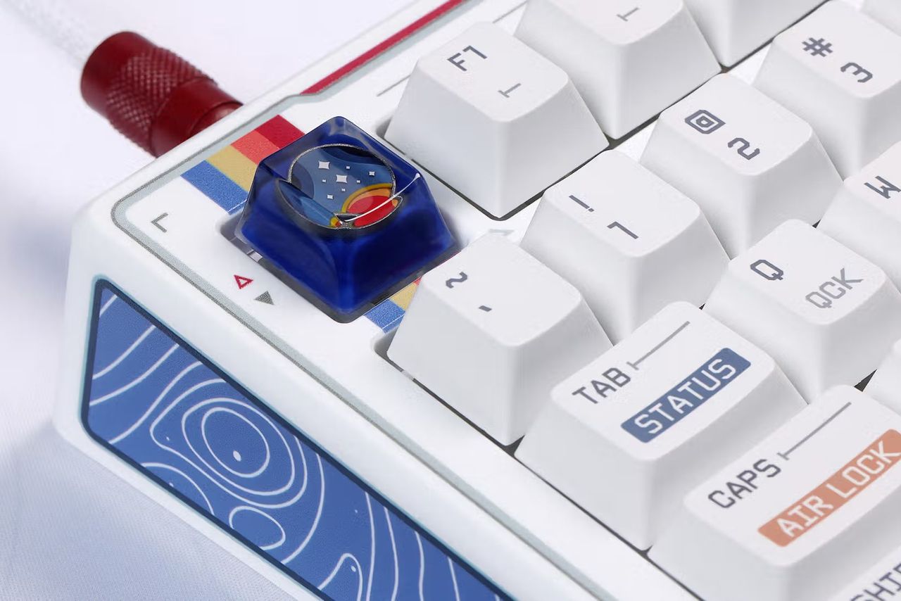 Shots of the keyboard, keys, cable, and deskmat included in the Drop x Starfield collab