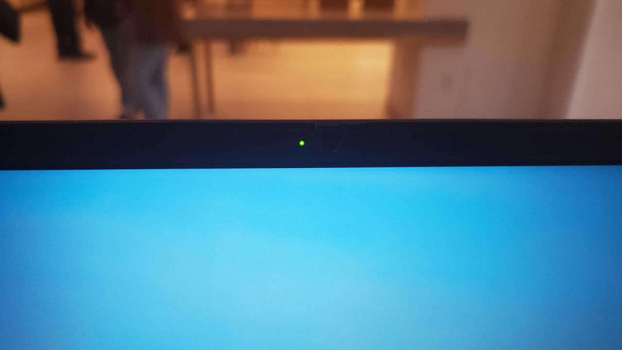 Chromebook Plus laptop on wooden table