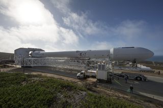 SpaceX's Falcon 9 rocket heads to the launchpad ahead of the launch of Jason-3, an ocean-monitoring satellite, from California's Vandenberg Air Force Base on Jan. 17, 2016.