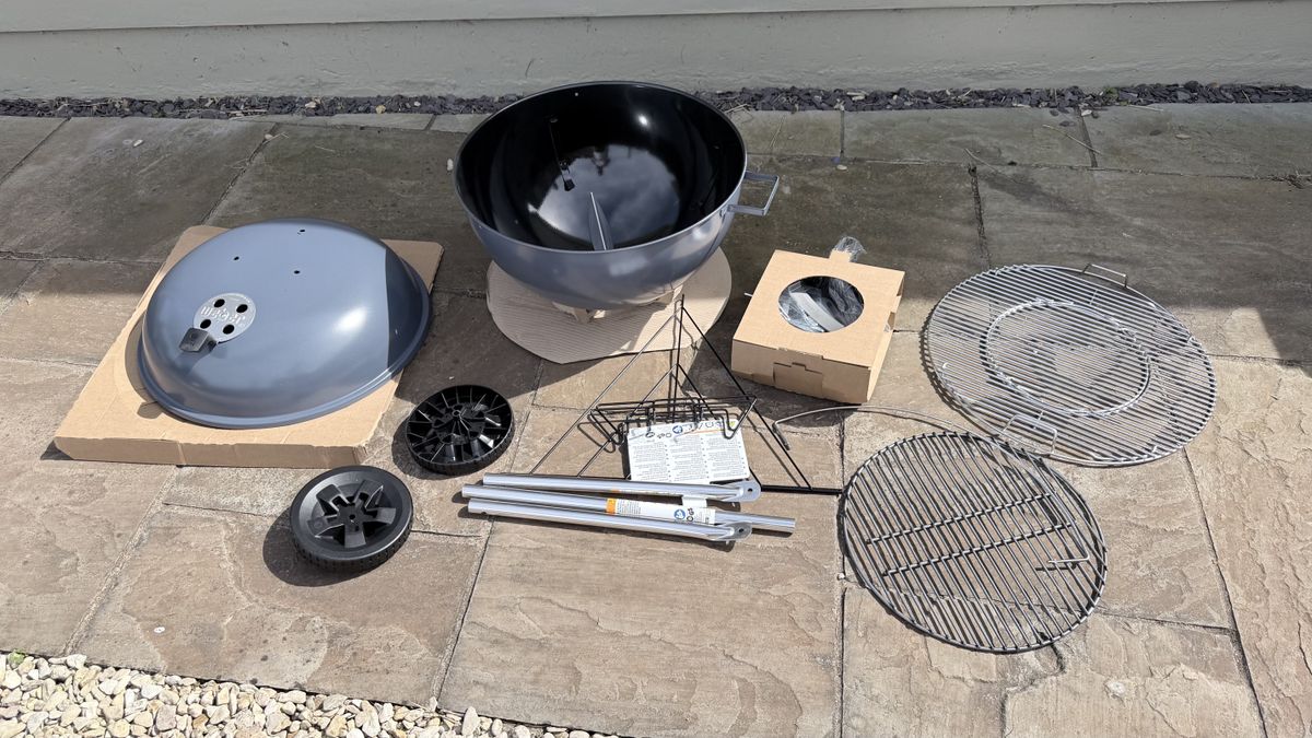 The Weber Master-Touch being assembled