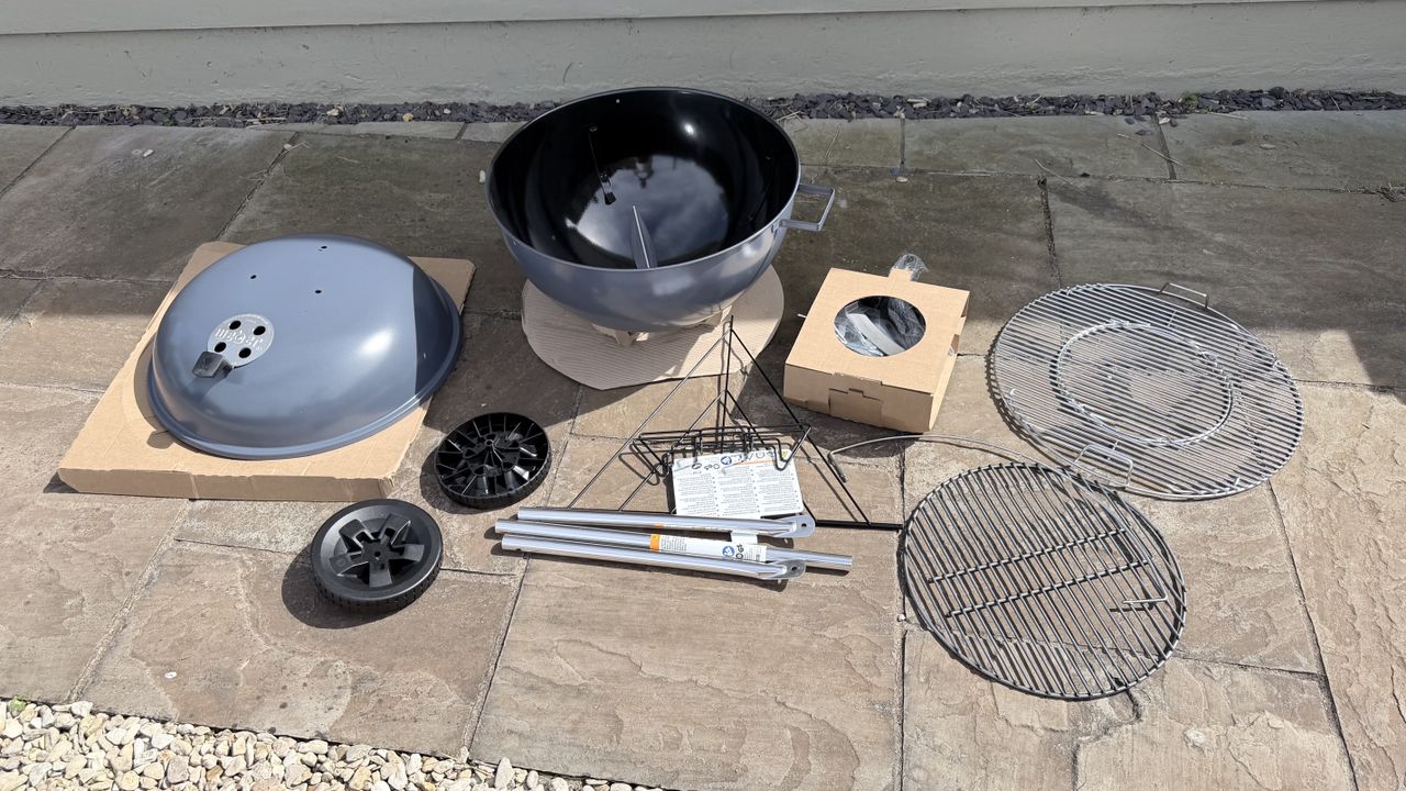 The Weber Master-Touch being assembled