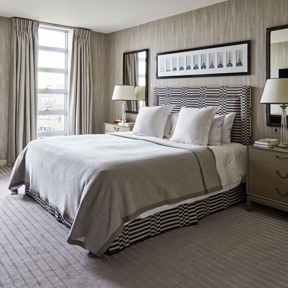bedroom with curtains and table lamps