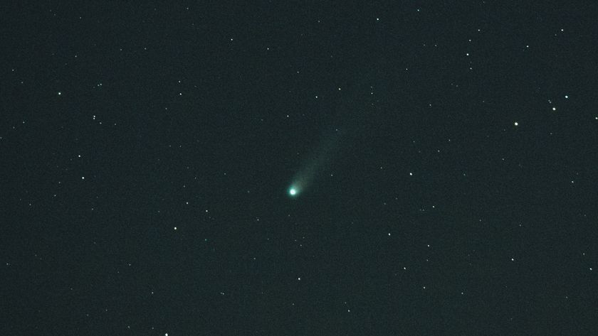 a green fuzzy streak in the night sky