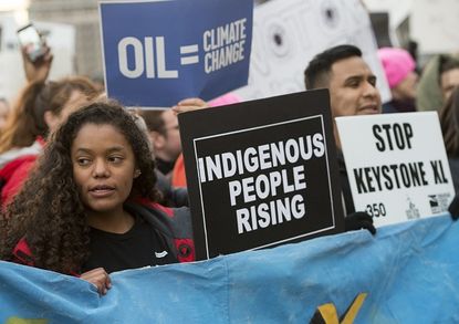 Protesters react to an earlier executive order clearing the way for Keystone XL.