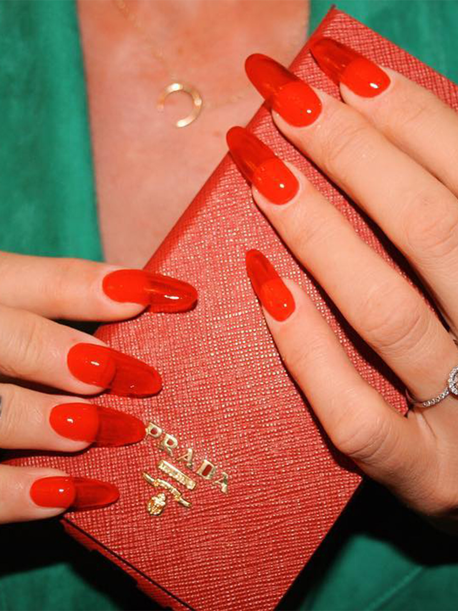 A cherry red jelly manicure by Imarni Nails.