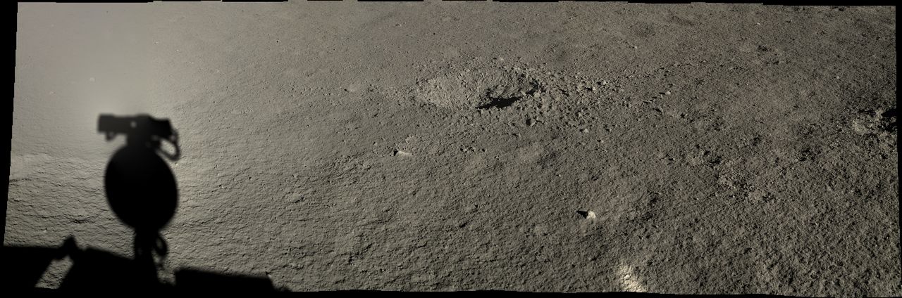 Yutu-2 inspects a relatively fresh crater.