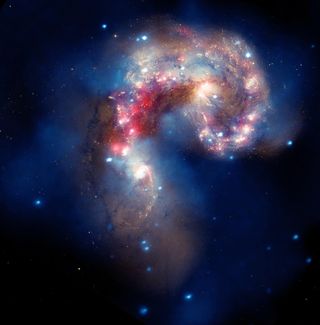 Colliding Galaxies Swirl in Dazzling New Photo