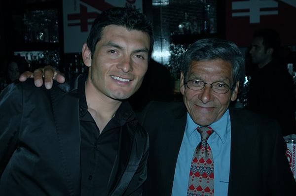 Fred Rodriguez (left) and his dad enjoy proceedings.