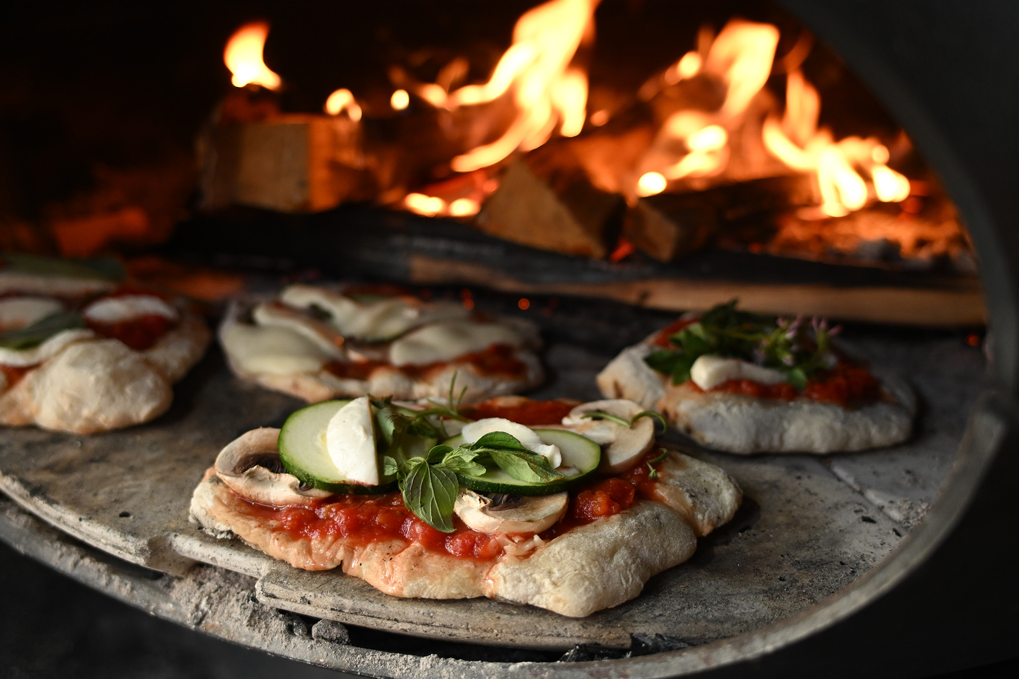 Pizza in front of a fire