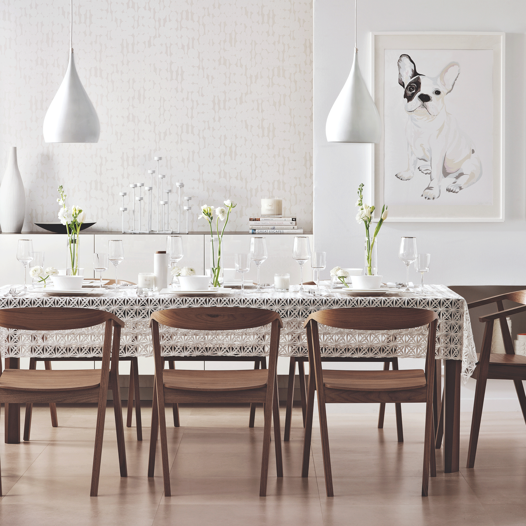 White walls with wooden table and chairs