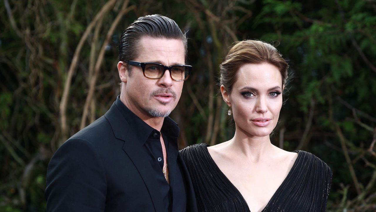 Brad Pitt and Angelina Jolie attend the &quot;Maleficent&quot; Costume And Props Private Reception in 2014