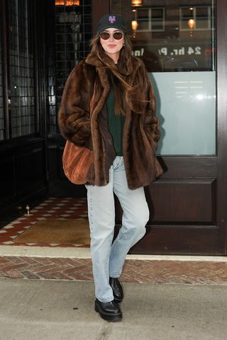 Dakota Johnson fall jeans and brown fur coat outfit