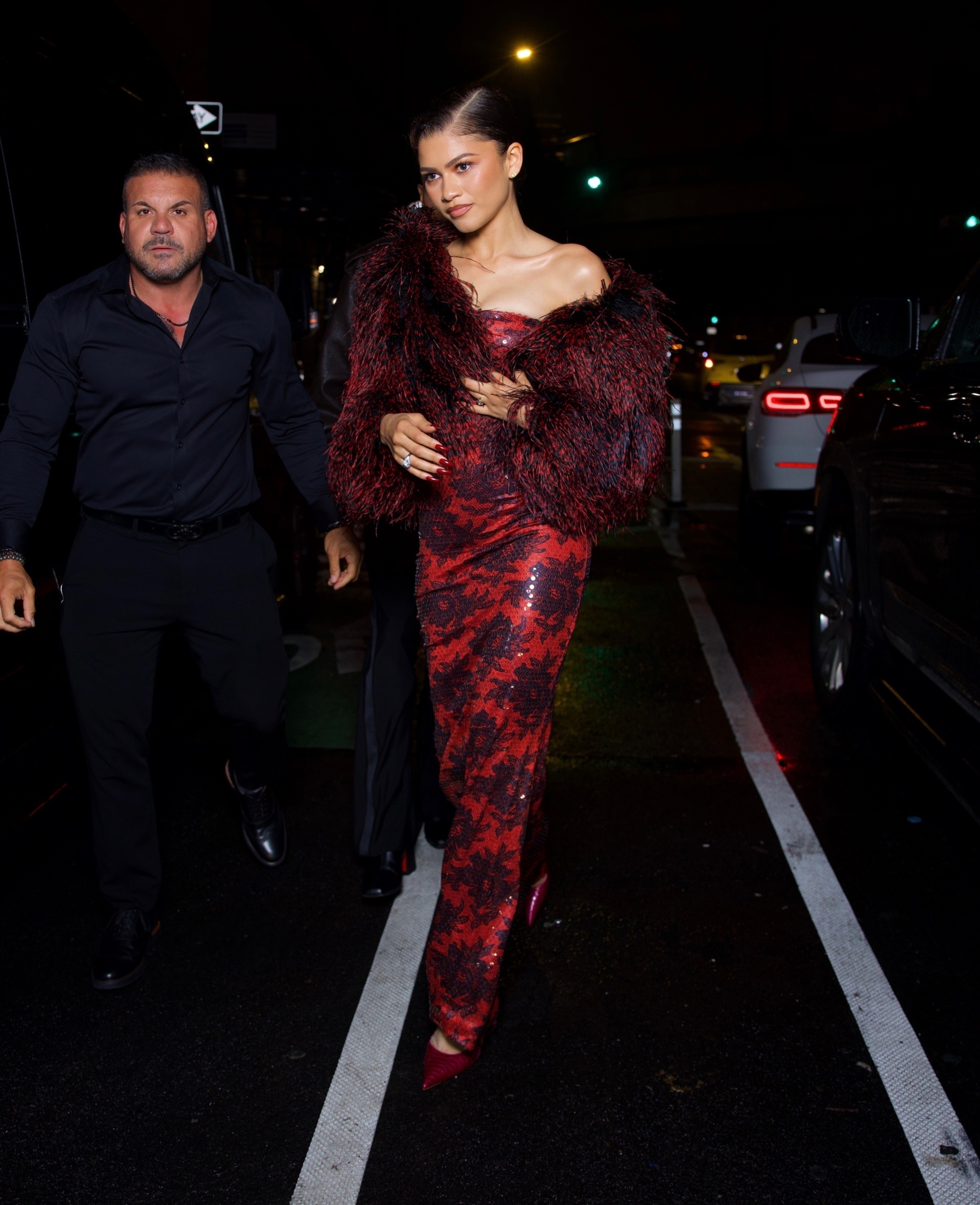 Zendaya exudes elegance as she swaps her white Met Gala-themed suit for a stunning red dress