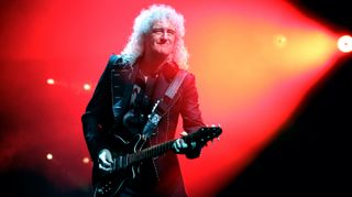 Brian May performs live with Queen + Adam Lambert at The O2 Arena on December 12, 2017 in London