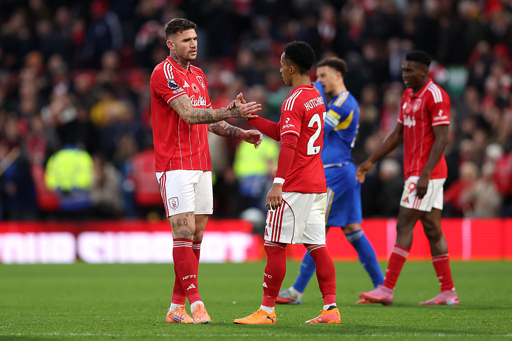 NOTTINGHAM, ENGLAND - NOVEMBER 09: Morato of Nottingham Forest shakes have with Omari Hutchinson of Nottingham Forest during the Premier League match between Nottingham Forest and Leeds United at City Ground on November 09, 2025 in Nottingham, England. (Photo by Matt McNulty/Getty Images)