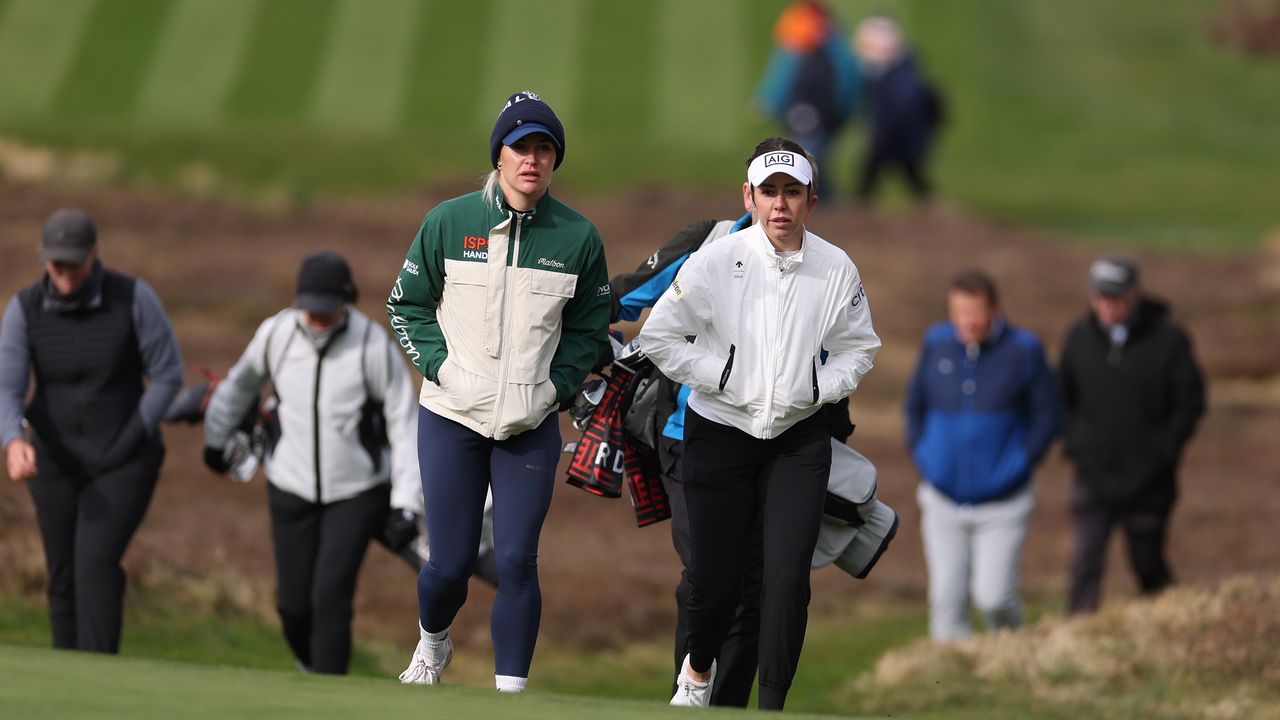 Charley Hull (left) and Georgia Hall walk during the 2025 Sunningdale Foursomes