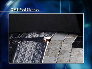Spacewalkers to Repair Shuttle Blanket, Wrangle Solar Wing