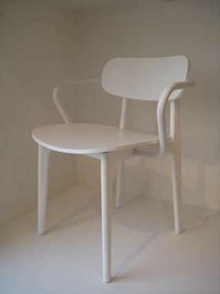 White floor and walls, white wooden chair