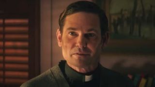 Henry Thomas looks forward with curious fear in Ouija: Origin of Evil.