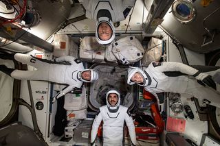 The SpaceX Crew-3 astronauts don their spacesuits on the space station on April 21, 2022. 