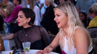 Katie Maloney and Ariana Madix dining at a table in Vanderpump Rules season 11