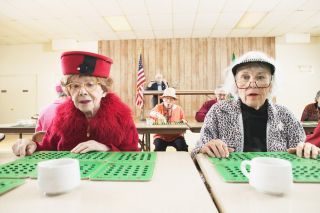 Two women playing bingo
