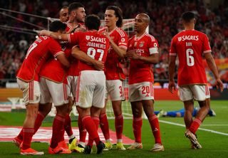 Benfica players celebrate a goal against Moreirense in April 2024.