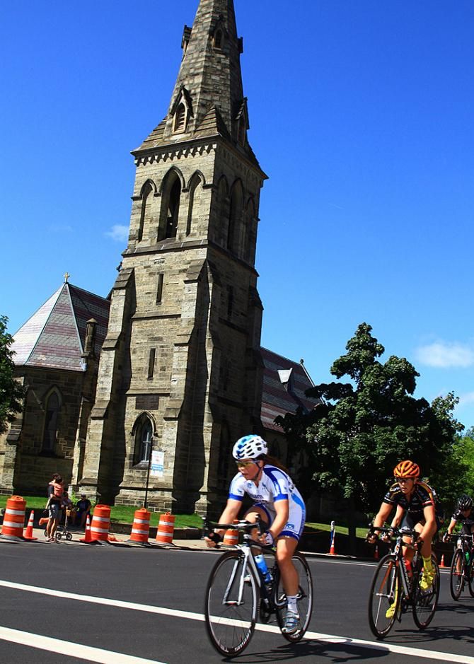 Morgan Brown (Team Novo Nordisk) stays on track for a good placement as she rides through the quiet town