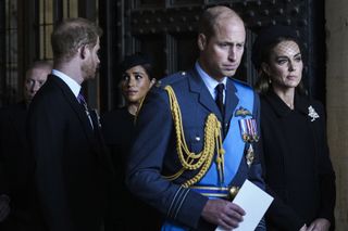 Prince Harry, Meghan Markle, Prince William and Prince Harry at Queen's funeral